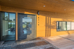 007_Terramont-Way-Contemporary-Home-Exterior-wood-entrance-2